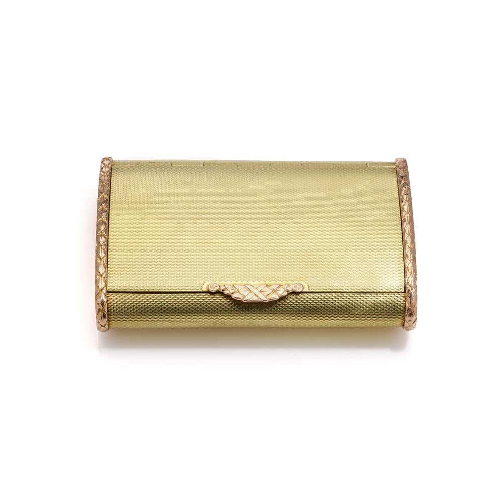 Cartier 18ct Gold Cigarette Case

This exquisite cigarette case, crafted by Cartier in London in 1933, is a fine example of the luxurious accessories from the early 20th century. The case is marked with the prestigious Cartier, London hallmark,