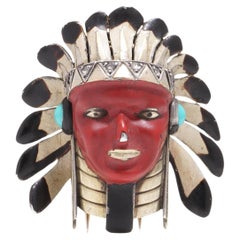 Vintage Cartier 18kt gold, silver, and enamel gem set Native American chief brooch 