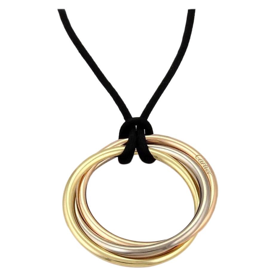 Cartier 18kt White, Yellow and Rose Gold Three Rings On The Silk Black Necklace For Sale