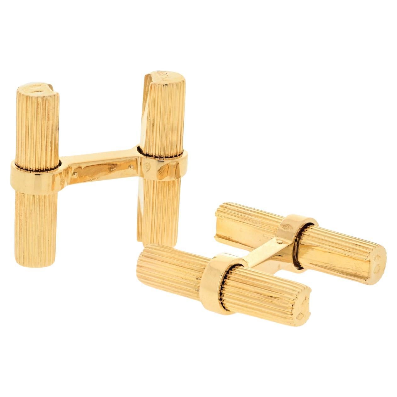 Exemplifying both elegance and versatility, these Cartier cufflinks are a masterpiece of design. Crafted in 18k yellow gold and hailing from the 1960s, they showcase a unique baton design that's perfect for daily wear. What truly sets these