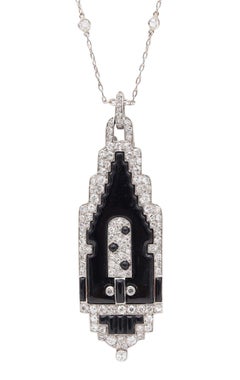 CARTIER 1920 Art Deco Platinum Enameled Pendant-Lorgnette With Diamonds & Onyx