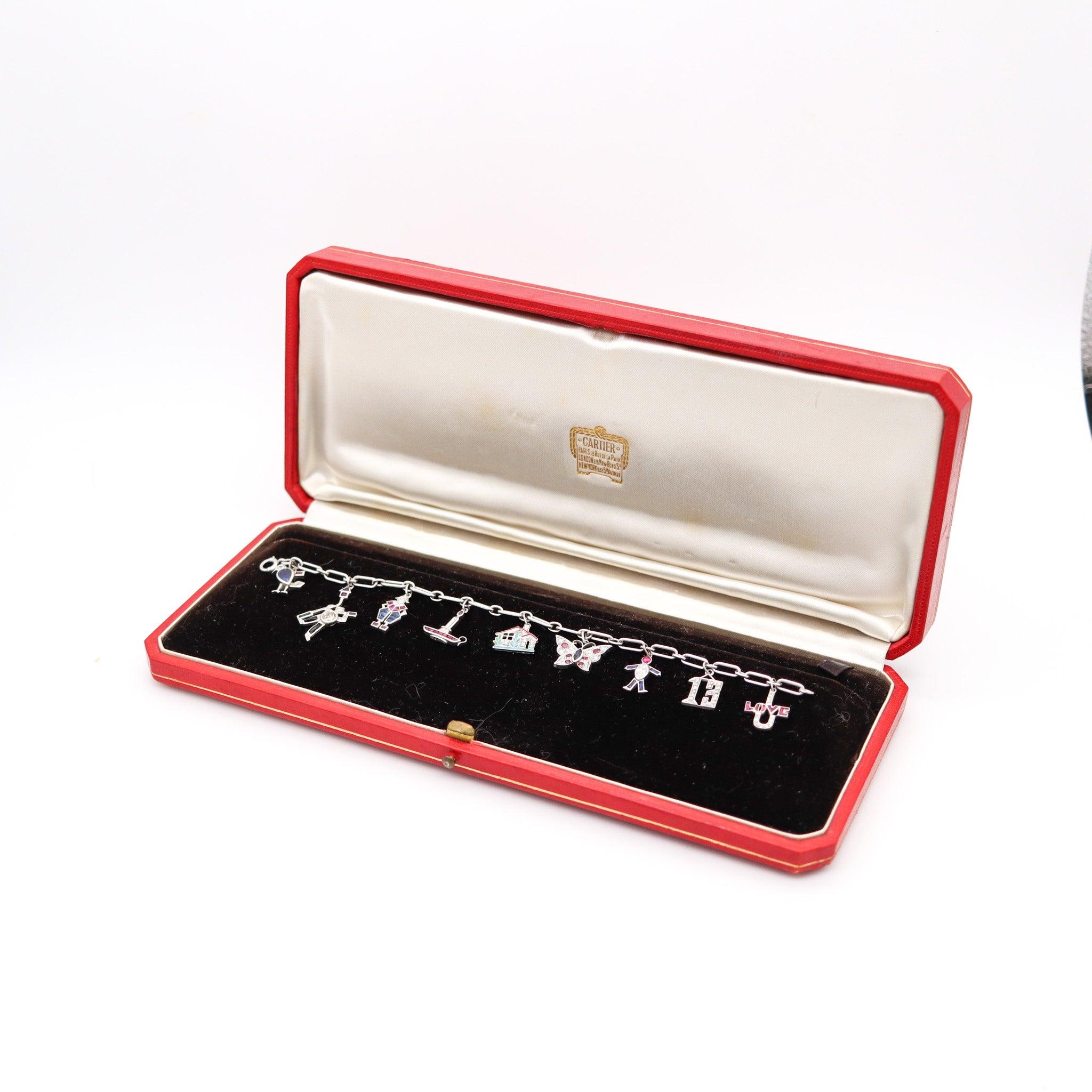CARTIER 1930 Art Deco Charms Bracelet Platinum With 6.04 Ctw In Diamonds & Gems In Excellent Condition For Sale In Miami, FL
