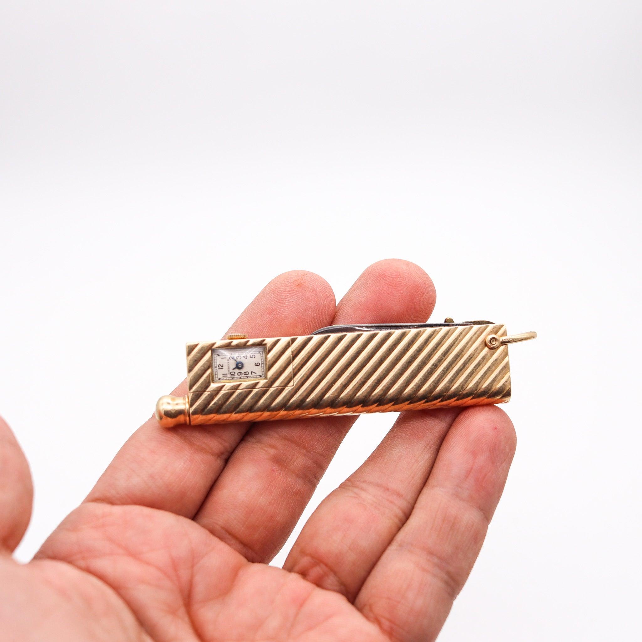 Multi-tools pocket-watch, knife, pencil and key designed by Cartier.

This is a very rare multi-tools pocket piece created by the French jewelry house of Cartier, back in the 1935. The piece has been designed with elegant art deco patterns in solid