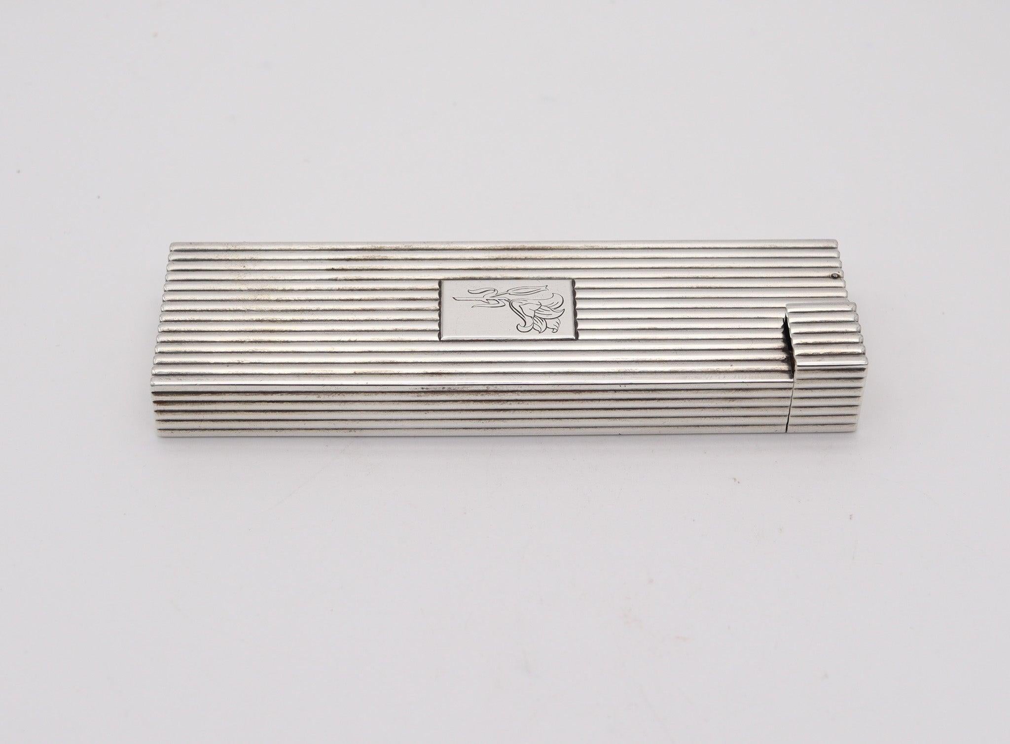An art deco tall desk-lighter designed by Cartier.

This is a beautiful and very rare desk-club petrol lighter, created in Paris France by the atelier-Frontin for the jewelry house of Cartier, back in the 1935. The large lighter has been crafted in