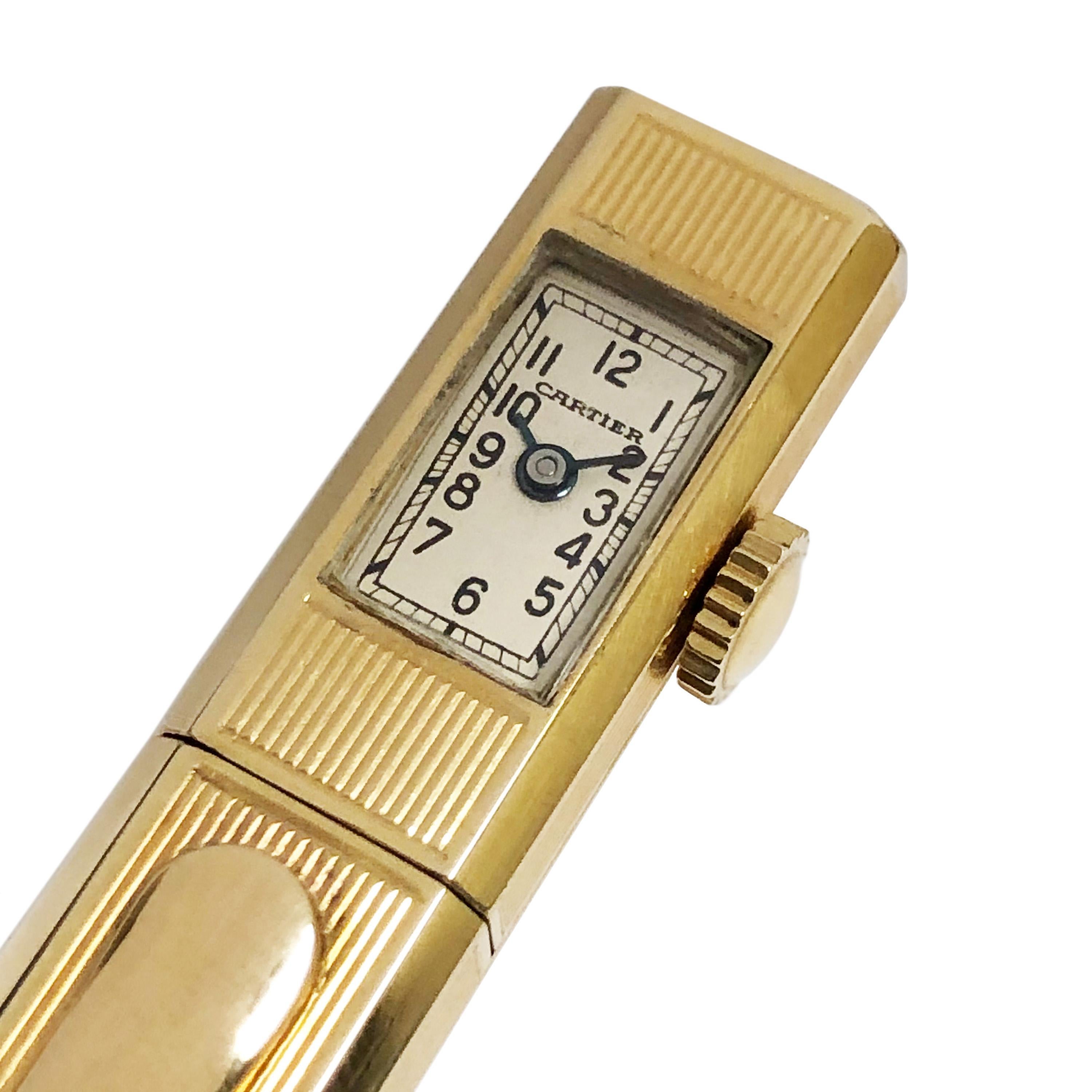 Circa 1940s Cartier 14K Yellow Gold Pencil, Watch measuring 5 1/8 inches in length and 7/16 inch wide, having an engraved ribbed design with Pocket clip. 17 jewel mechanical, manual wind Perry Watch Co. Movement, white dial with Black Arabic