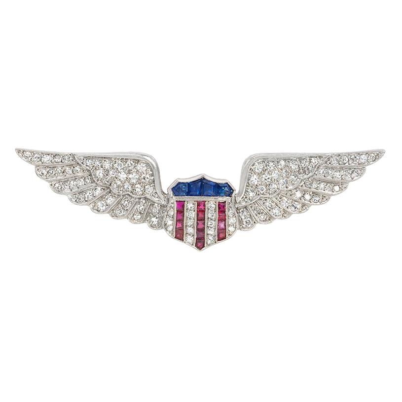 Cartier 1940s Patriotic Diamond, Sapphire, and Ruby Winged Shield Brooch
