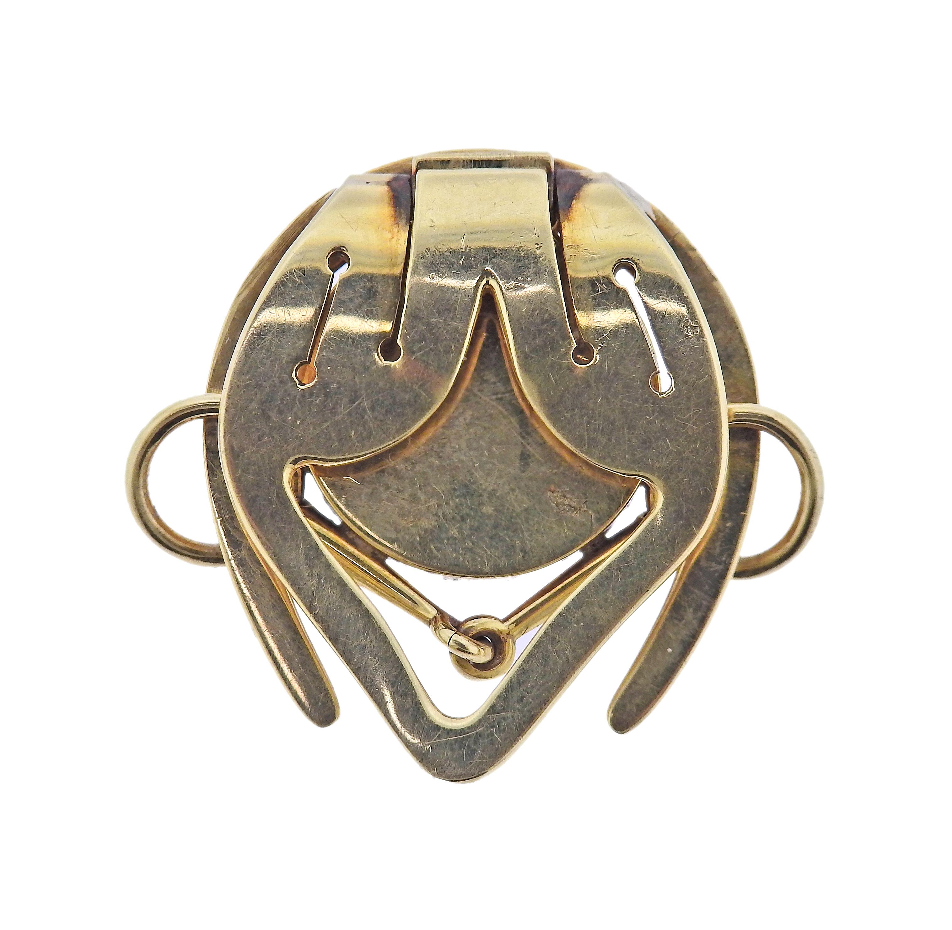 Vintage, circa 1940s Cartier 14k gold clip, with reverse painting under crystal, depicting horse head. Clip measures 1