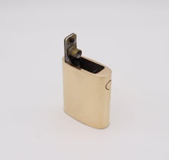 CARTIER 1950 Modernist Semi Automatic Petrol Lighter In Polished 14Kt Yellow