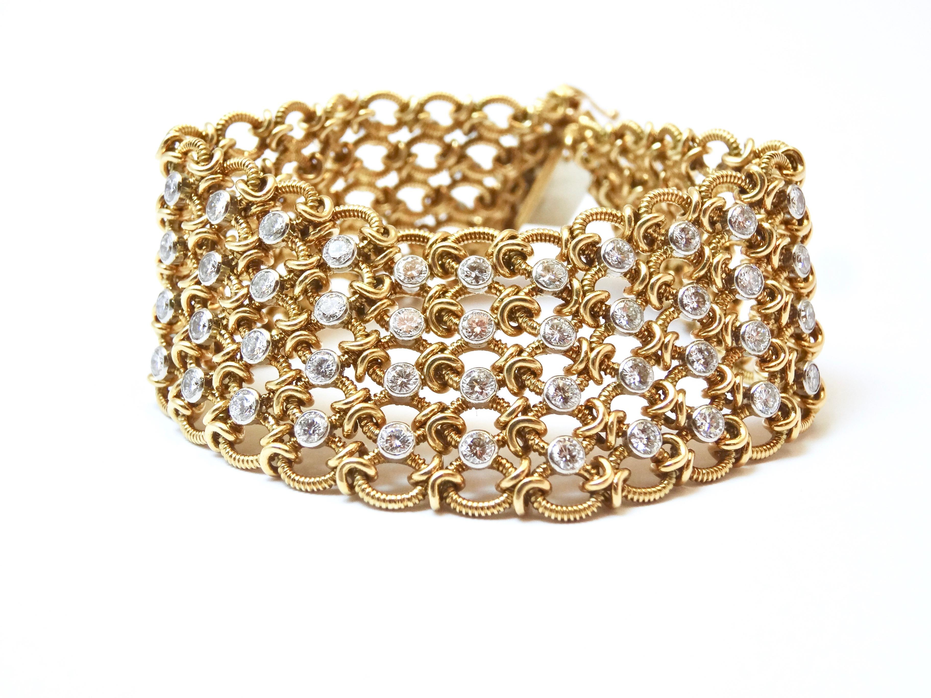 Very elegant and delicate Cartier Bracelet, soft mesh, in yellow gold and platinum set with diamonds. 
Year : 1960. 
length : 17,5 cm
67,3 grs