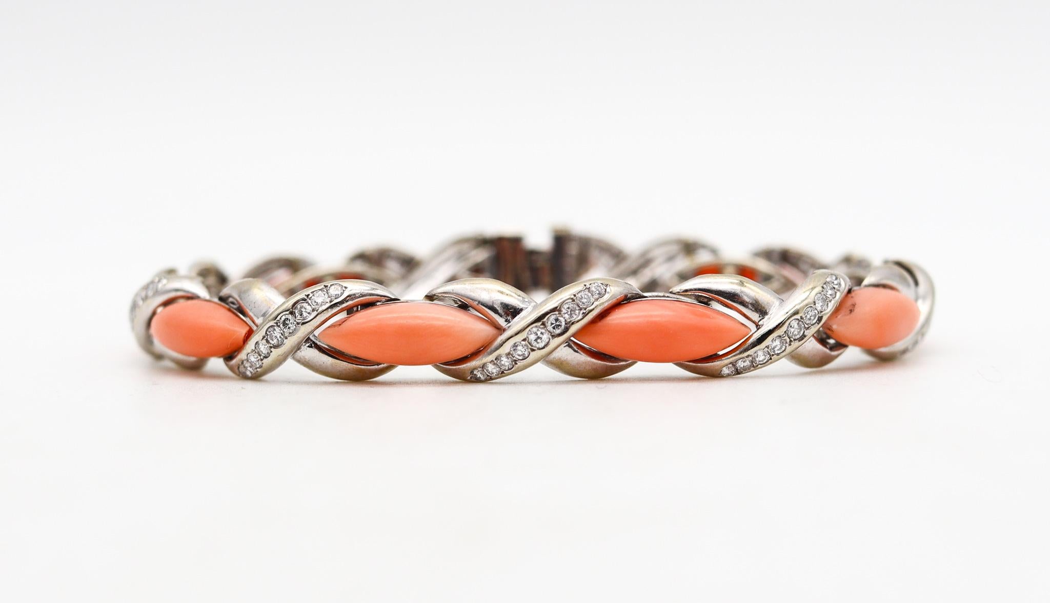 Beautiful coral bracelet designed by Cartier.

A very elegant bracelet, created by the Parisian jewelry house of Cartier in the late 1960. This bracelet was crafted in solid white gold of 18 karats with high polished finish. Exceptional craftmanship
