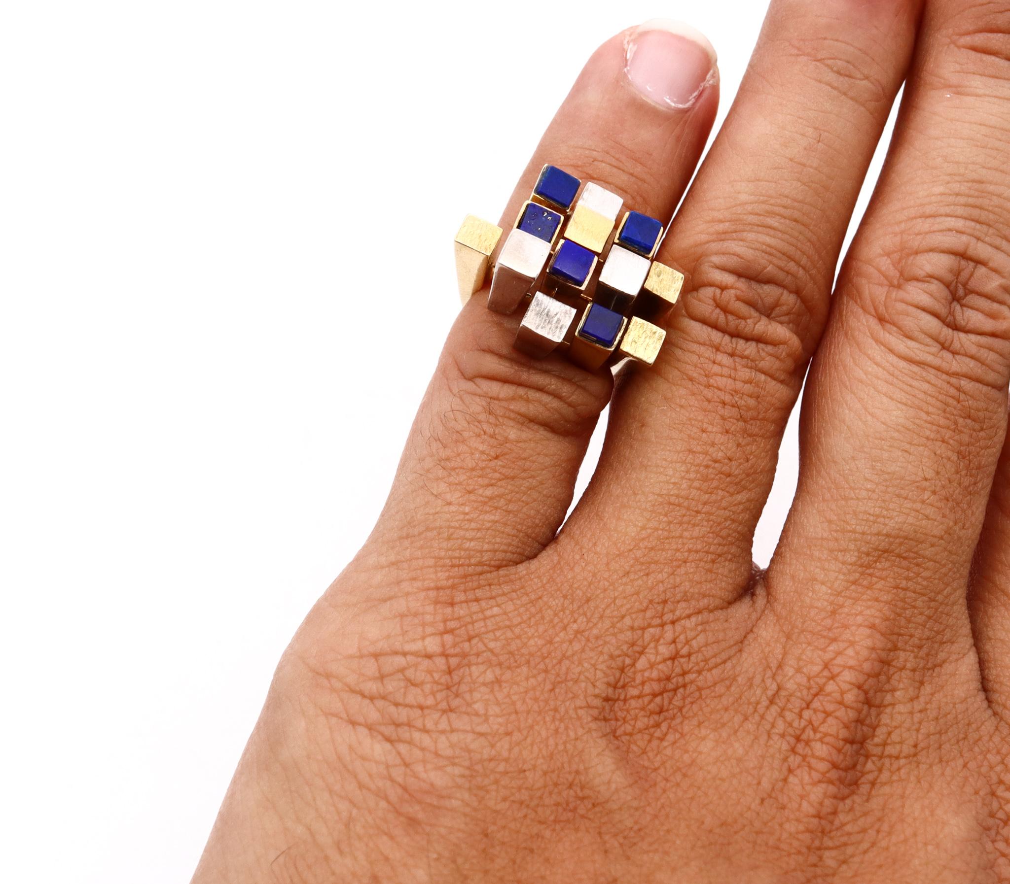 Rare geometric cocktail ring designed by Cartier.

An important and historical piece created in New York city, back in the late 1960's. Designed as a wearable cubism little sculpture, with an interesting pattern of volumetric elements. It was