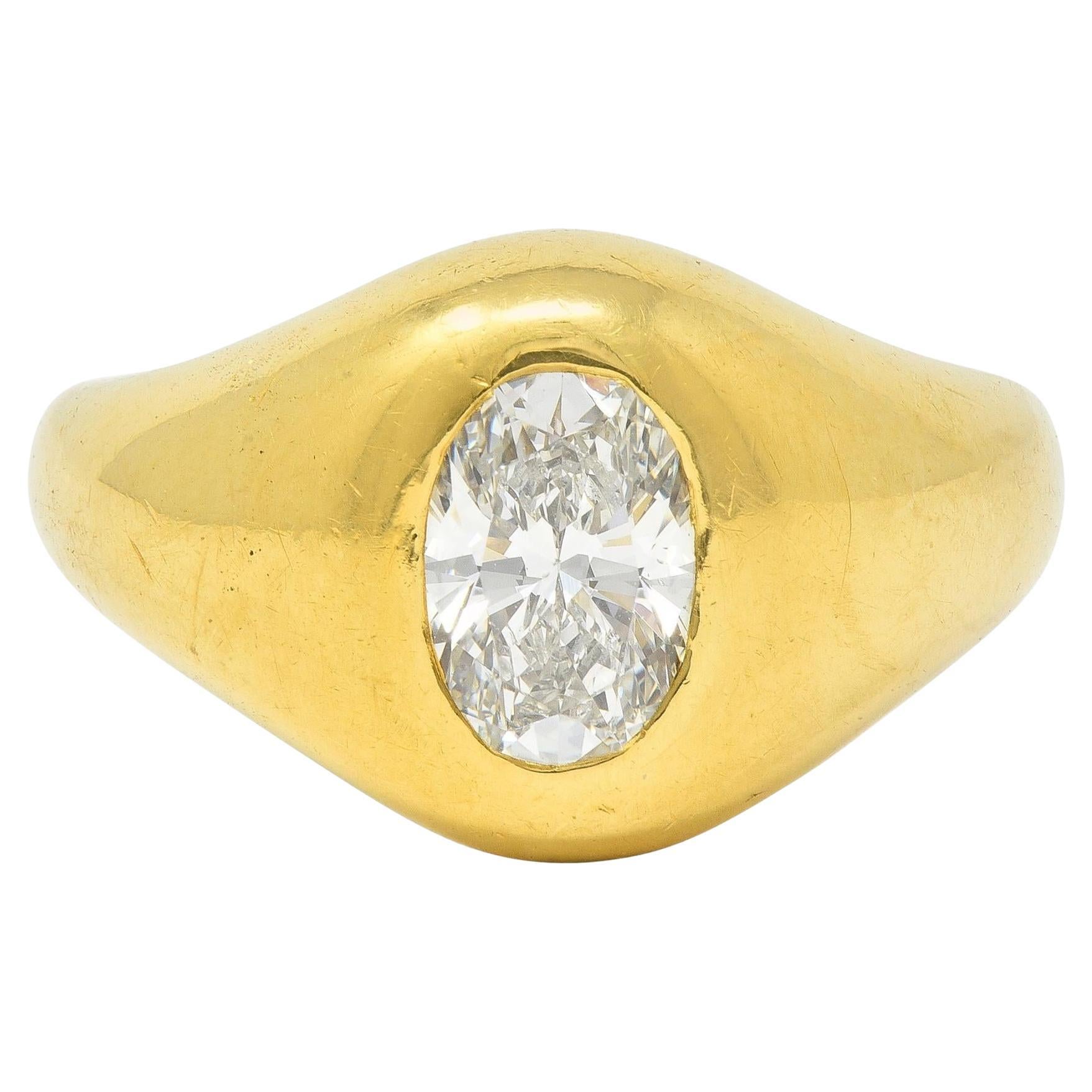 Cartier 1960's 1.22 CTW Oval Cut Diamond 18 Karat Yellow Gold Unisex Signet Ring For Sale