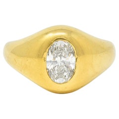 Vintage Cartier 1960's 1.22 CTW Oval Cut Diamond 18 Karat Yellow Gold Unisex Signet Ring