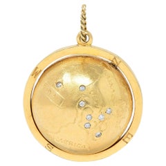 Cartier 1960's Diamond 14 Karat Yellow Gold Spinning World Globe Pendant