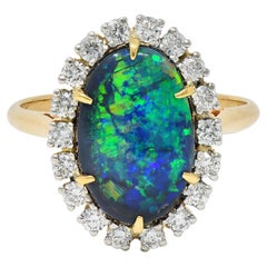 Cartier 1960's Diamond Opal Platinum 18 Karat Gold Vintage Halo Ring