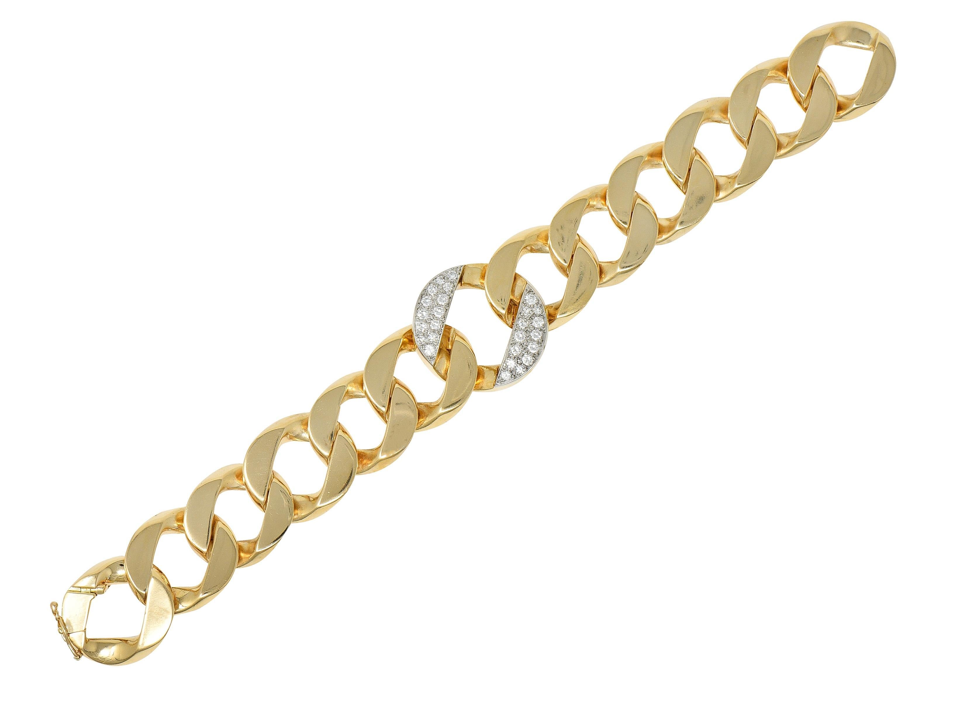 Designed as a large curb link chain bracelet centering one larger link
Platinum-topped and pavé set with single and round brilliant cut diamonds 
Weighing approximately 1.20 carats total - G color with VS1 clarity
With high polish finish and
