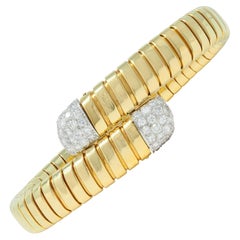 Cartier 1960's Diamond Platinum 18 Karat Tubogas Retro Bypass Cuff Bracelet