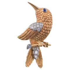 Cartier 1960s Diamond Sapphire Gold Bird Brooch 