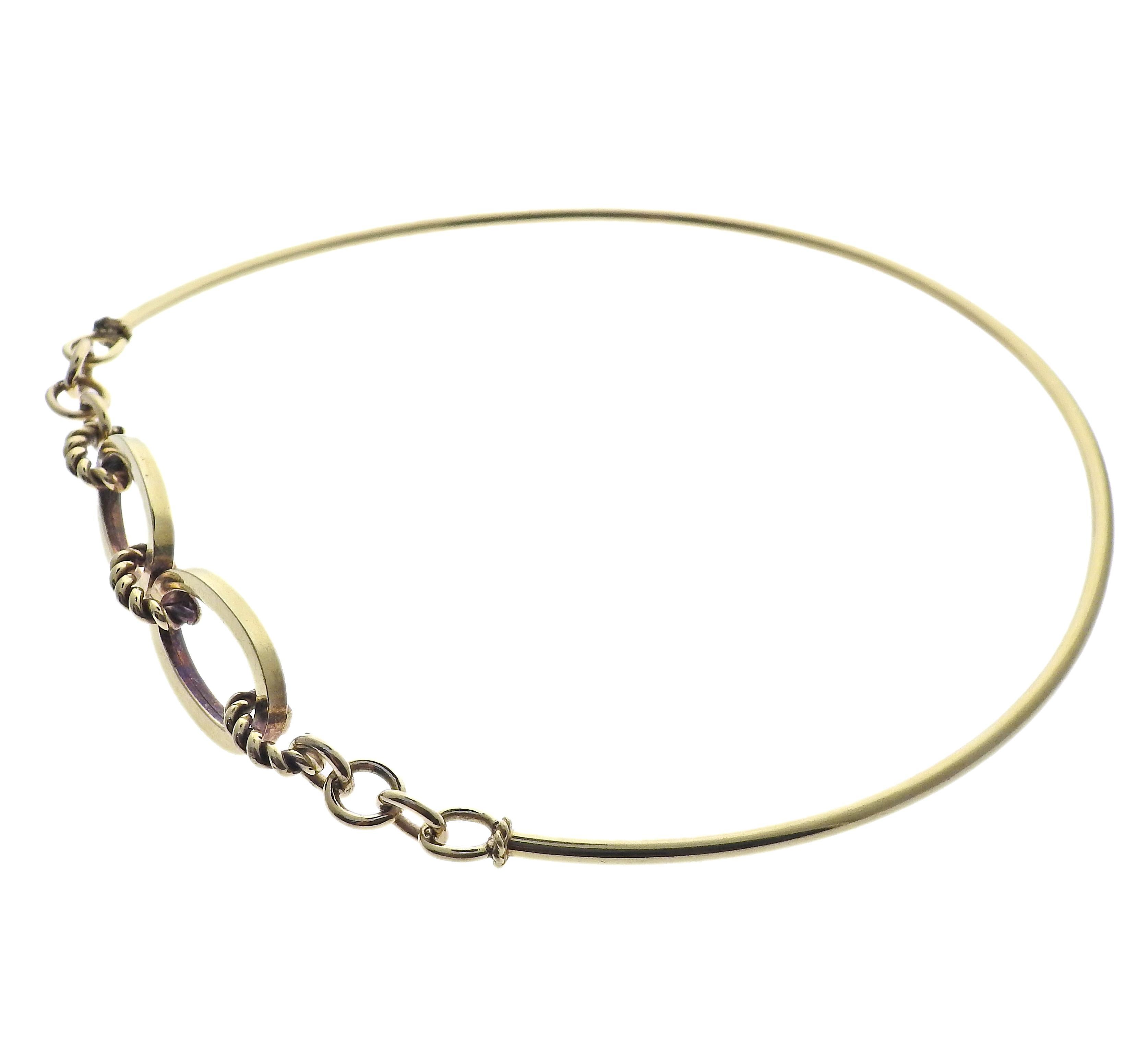 Vintage circa 1960s 18k gold link choker necklace by Cartier. Necklace will fit approx. 13