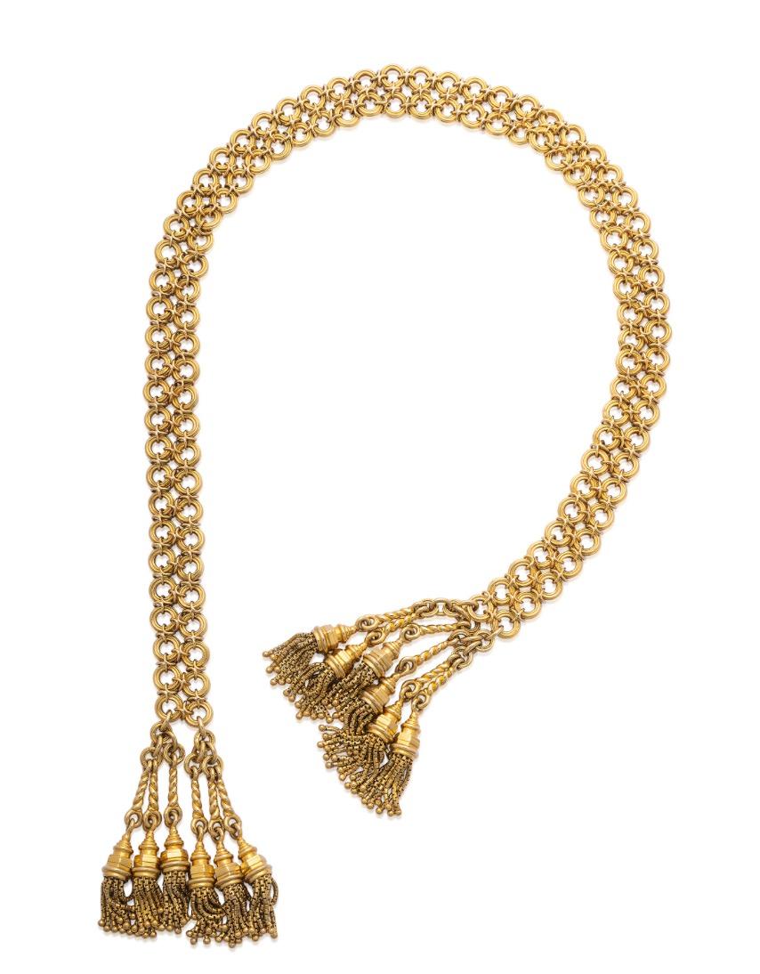 Cartier 1960's Gold Lavallliere Necklace
This necklace is lavalliere necklace of interlocking circular chain with rope-like tassels at the end all in 18k yellow gold. With Cartier marker's mark. 
Length: 22.8 inches; Weight: 235 grams