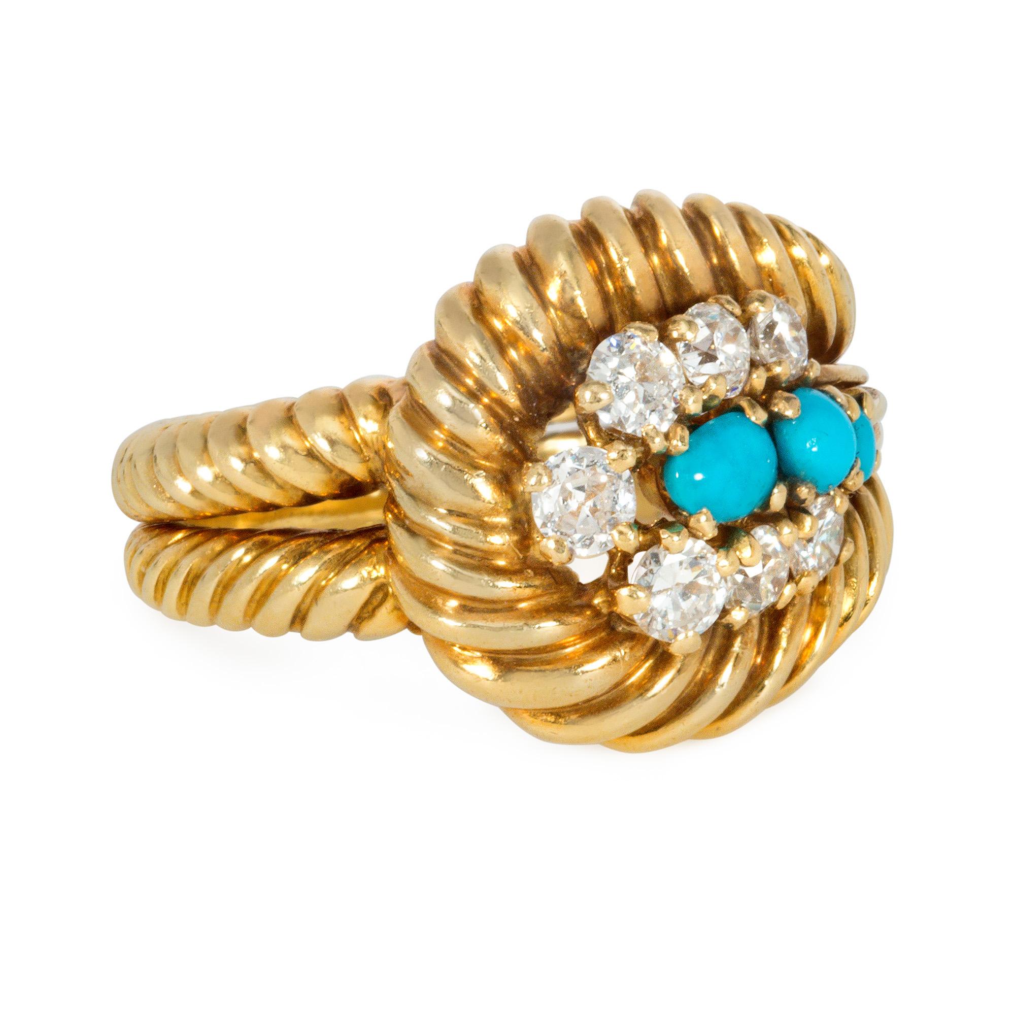 A mid-century diamond, turquoise, and gold ring of tapered design, centered by graduated turquoise in a diamond surround, giving way to gold wirework in a reeded gold border with split shoulders and double band shank, in 18k.  Cartier, London. 