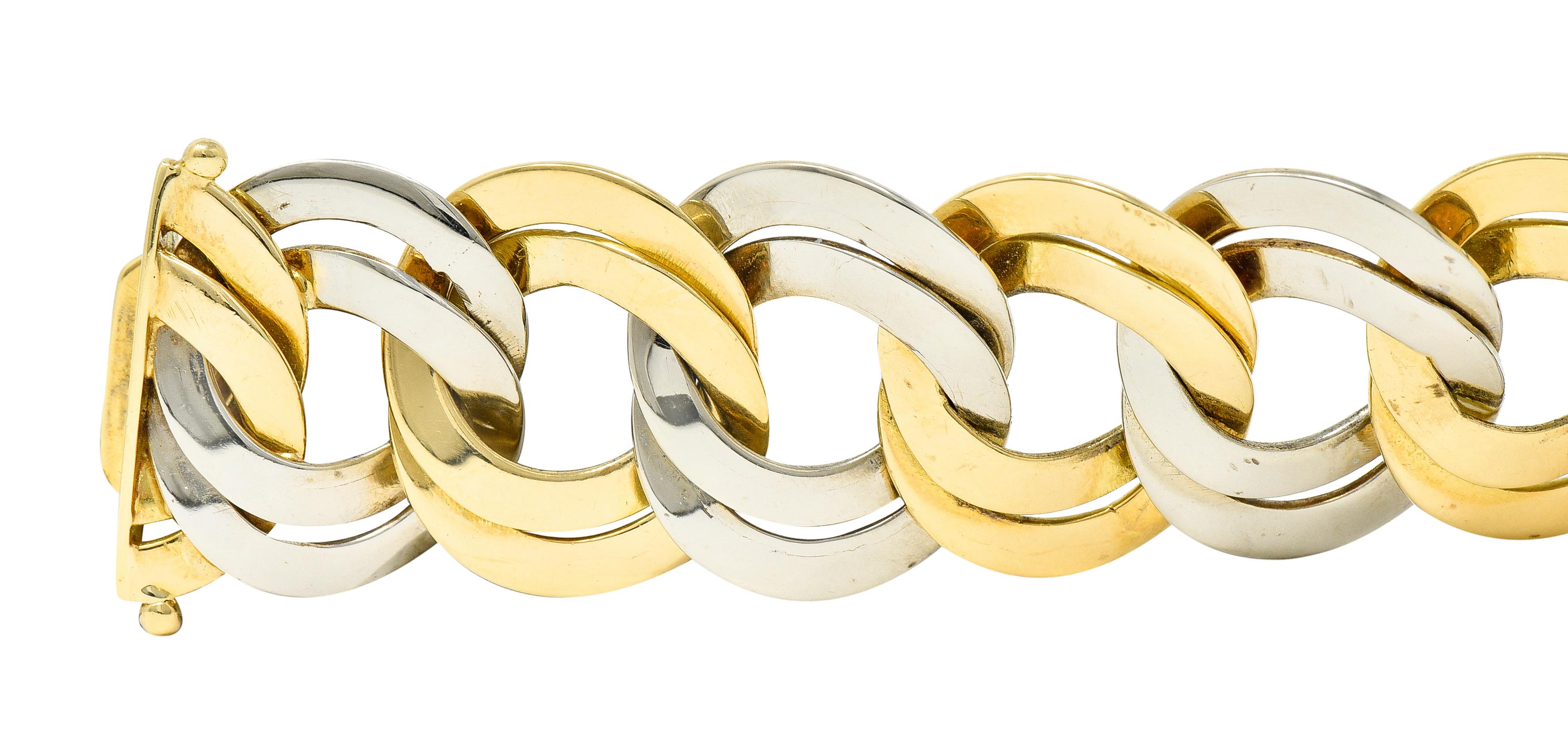 Cartier 1960er Jahre 18 Karat zweifarbiges Gold-Gliederarmband mit doppelter Kurbelkette (Zeitgenössisch) im Angebot