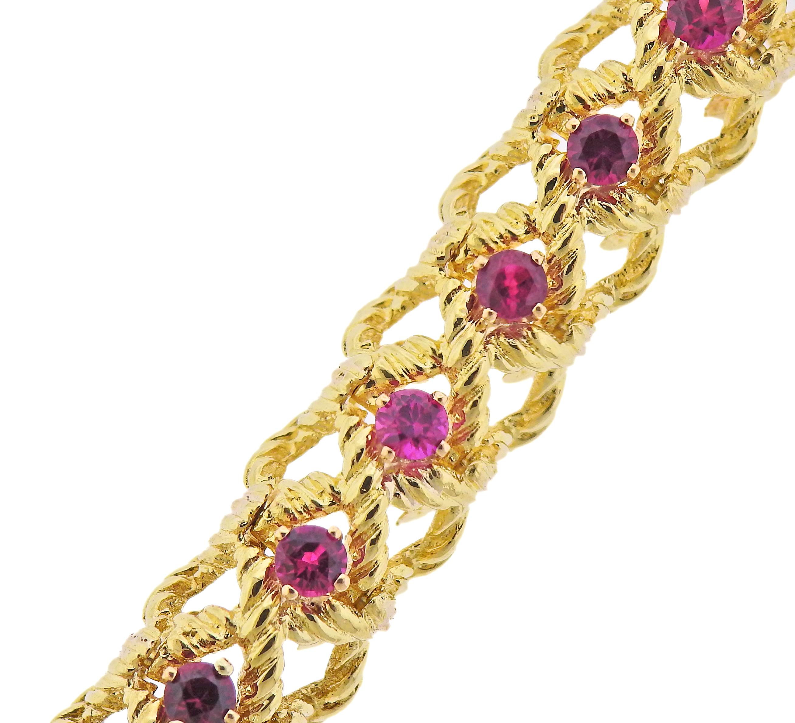 1960s Cartier 18k god bracelet with rubies. Bracelet is 7.5