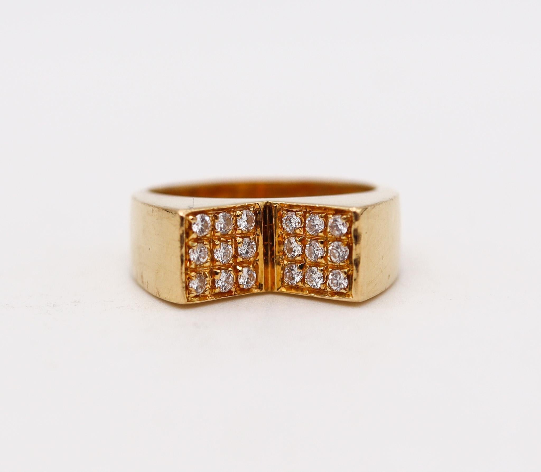 Geometric modernist ring designed by Cartier.

An unusual sculptural V shaped ring, created by the house of Cartier, back in the 1970. It was crafted with geometric patterns in solid yellow gold of 18 karats with high polished finish. 

Diamonds: