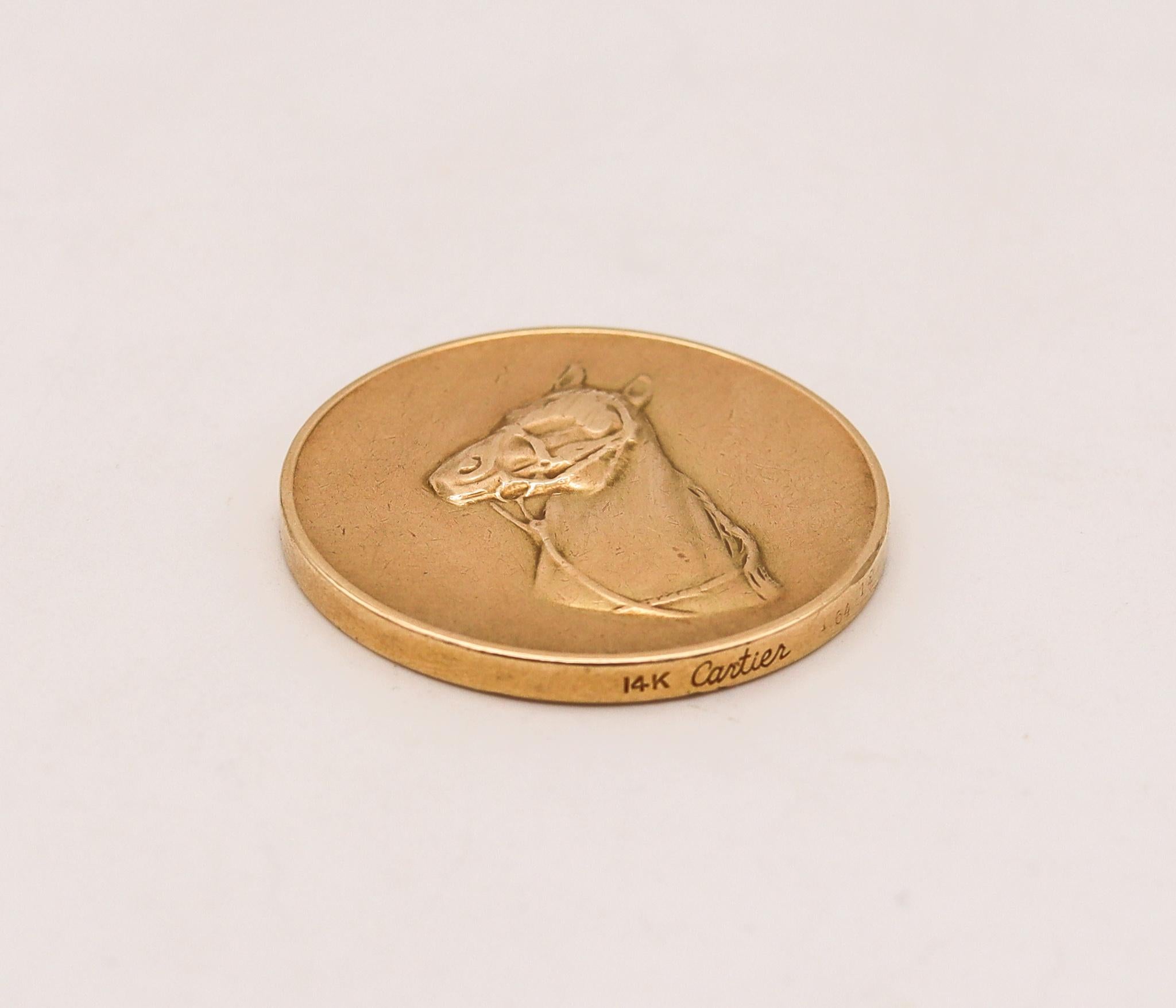 A head or tail coin designed by Cartier.

Extremely rare piece, created by the house of Cartier, back in the 1970. This is a very unusual amusement coin-medal for the head or tail game, crafted in solid yellow gold of 14 karats. Show in the obverse