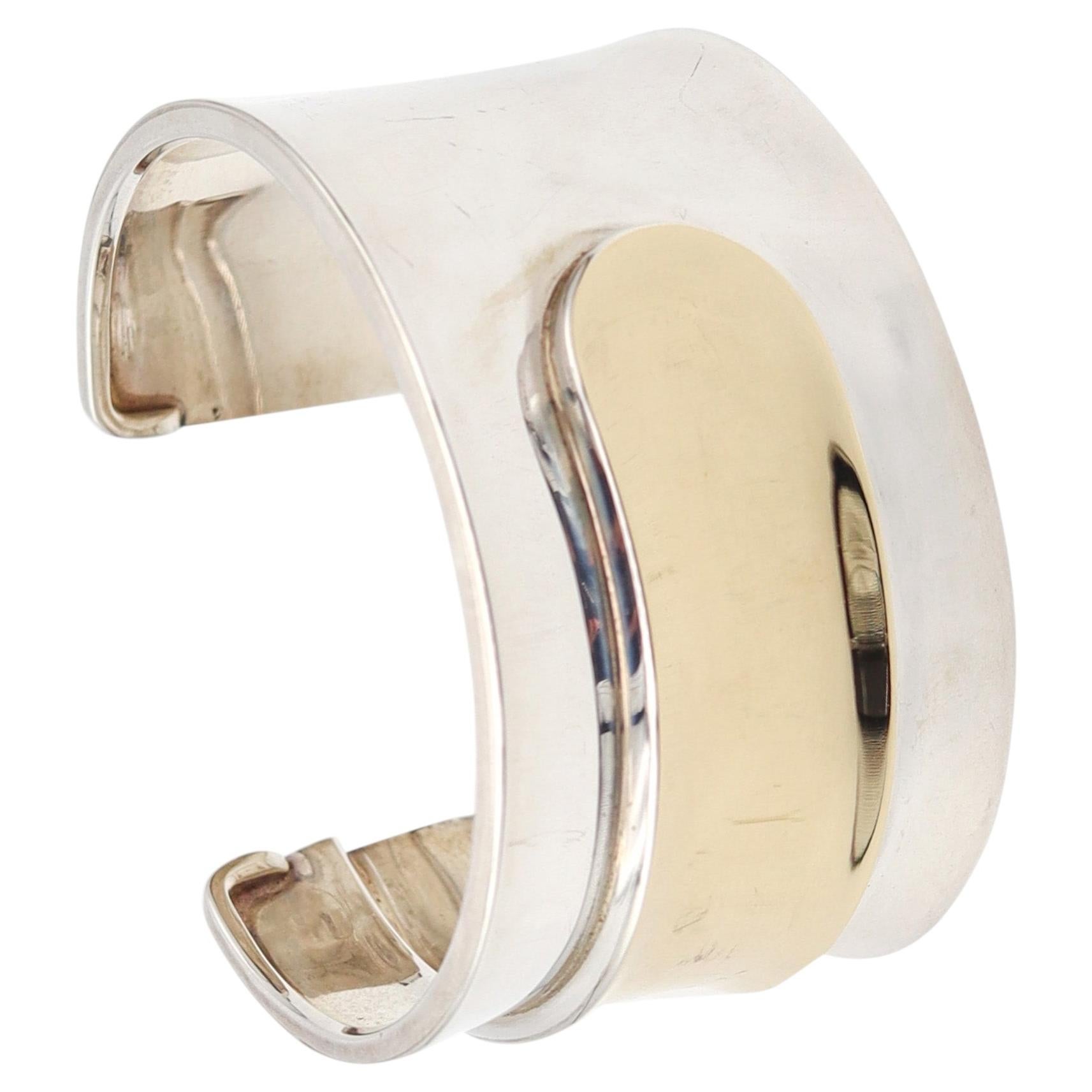 CARTIER Bracelet manchette géométrique moderniste 1970 en or jaune 18Kt et sterling