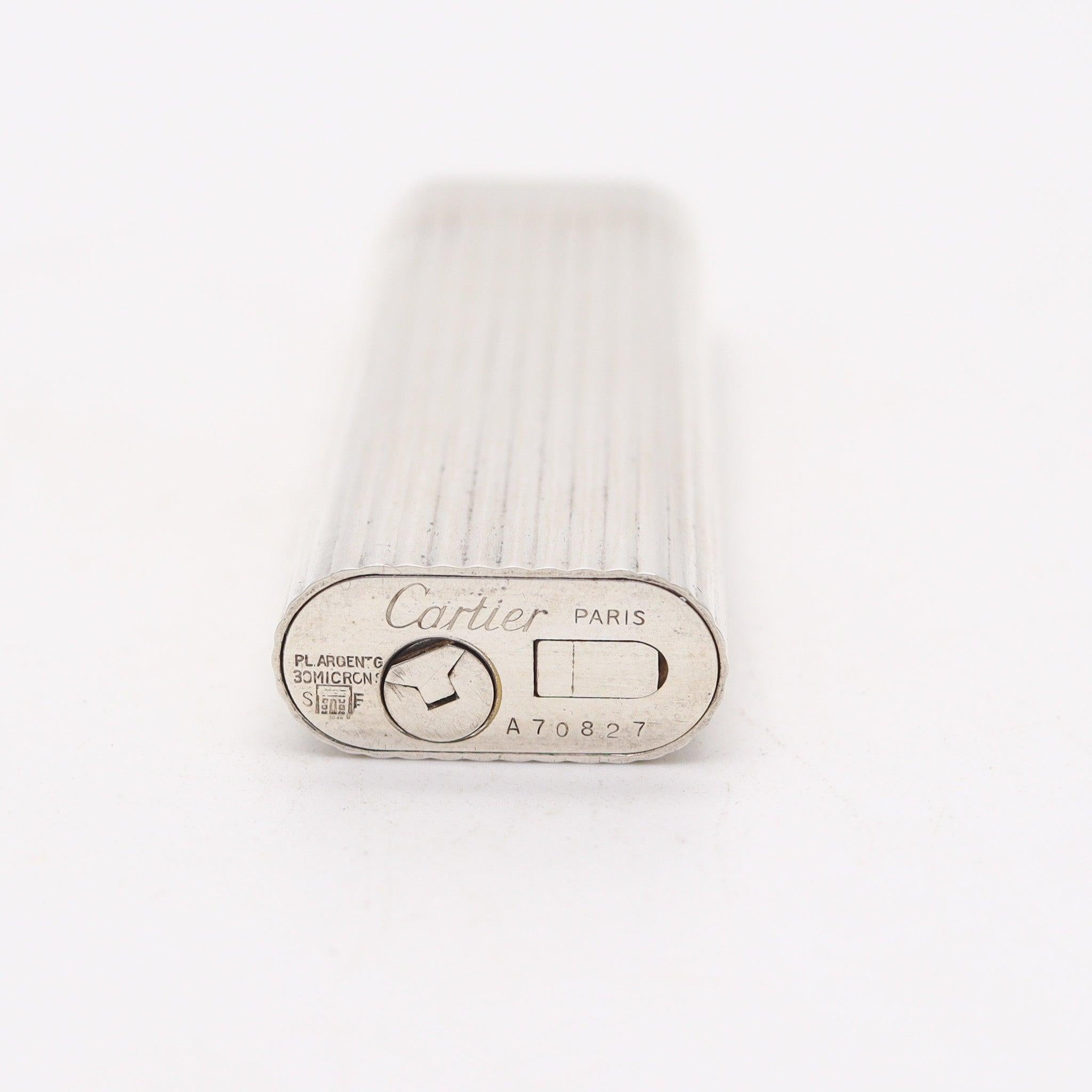 Francese Cartier 1970 Paris Linear-Oval Pocket Butane Gas Lighter In Plaqué d'Argent in vendita