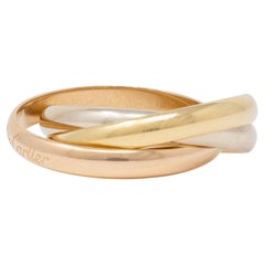 Cartier 1970's 18 Karat Tri-Colored Gold Vintage Rolling Trinity Band Ring