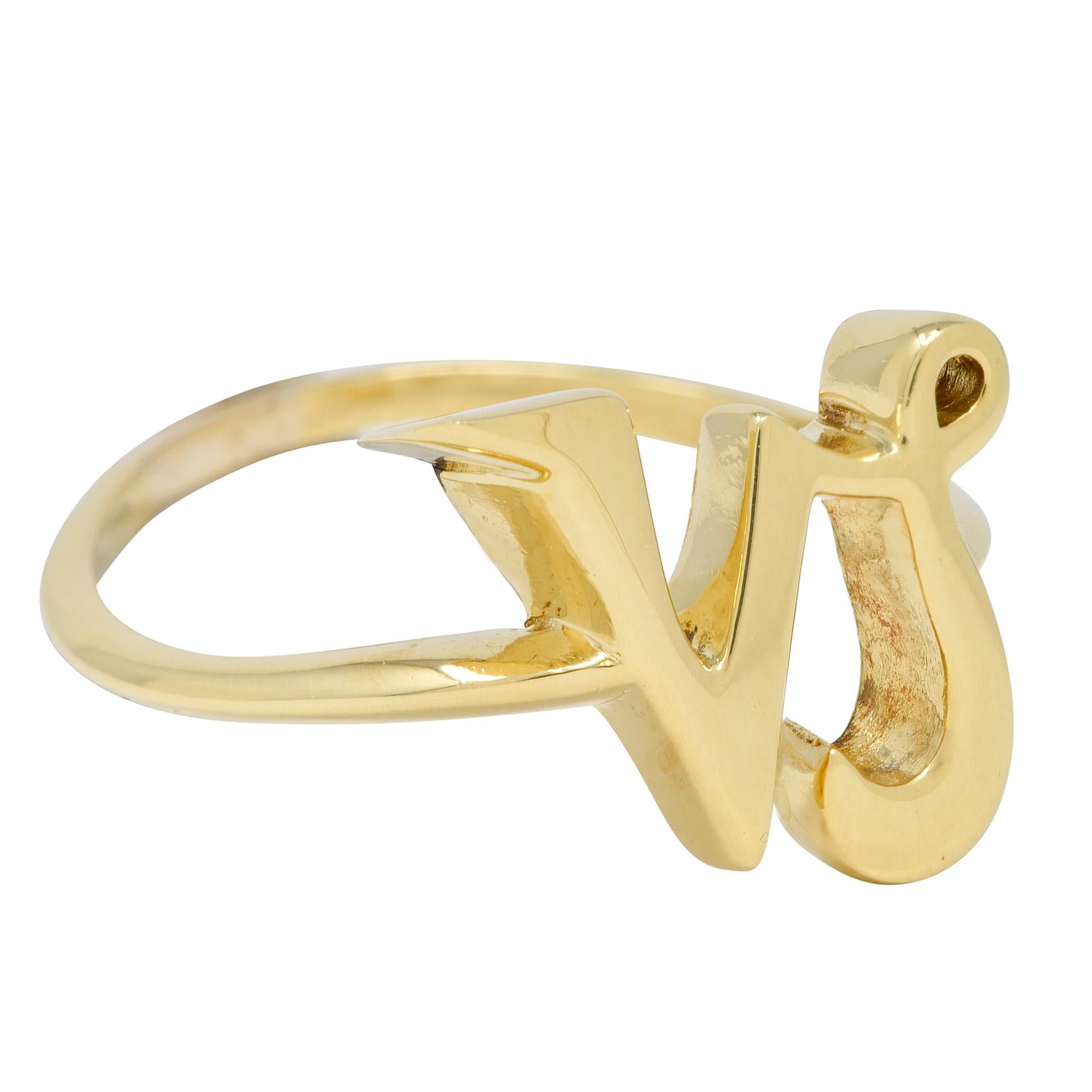 Centering a stylized scrolling Capricorn symbol 
Flanked by knife edge shoulders 
With high polish finish
Capricorn is the zodiac for December 22nd - January 19th
Stamped 18k for 18 karat gold
Fully signed for Cartier
Circa: 1970s
Ring size: 8 1/2