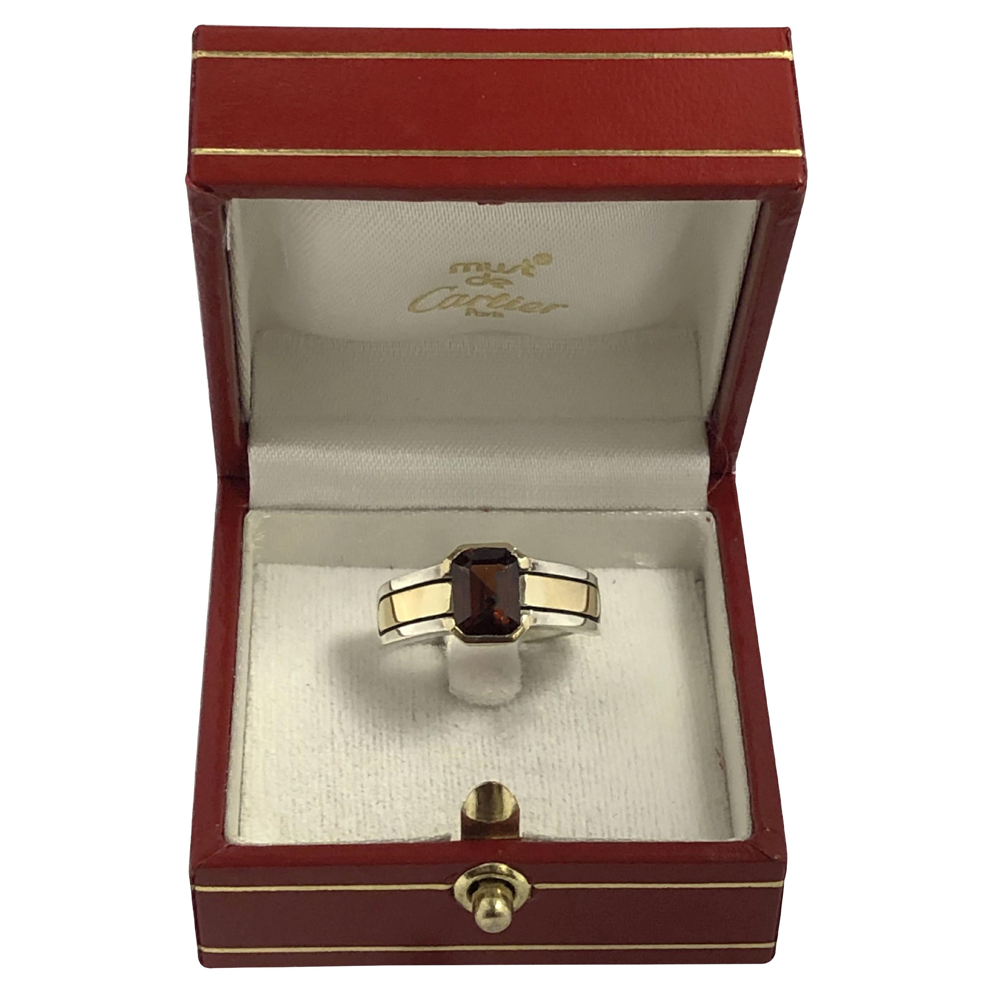 Cartier 1970er Jahre Granat-Ring aus 18 Karat und Silber im Angebot