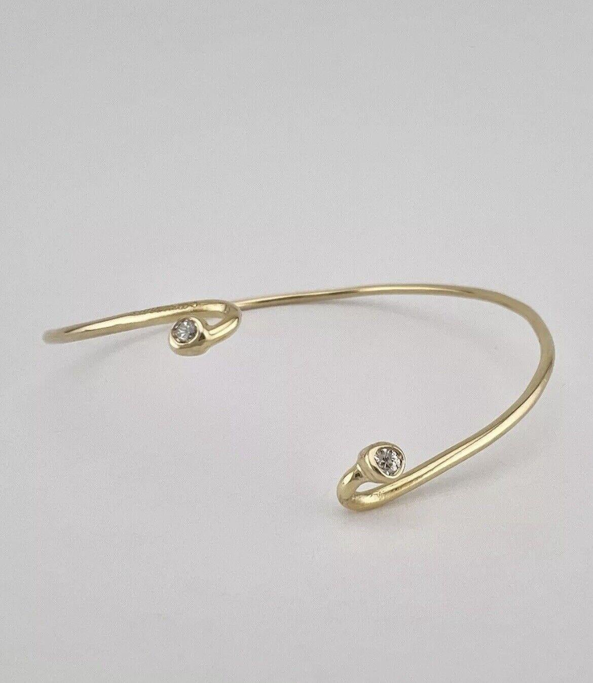 Cartier Vintage 1970s 18k Yellow Gold & Diamond Wire Bangle Bracelet

Here is your chance to purchase a beautiful and highly collectible designer bracelet.  Truly a great piece at a great price! 

Details:
Size : 7 inches
7.6 grams
Fully