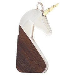 Cartier 1970's Carved Wood Sterling Silver 18 Karat Gold Vintage Unicorn Pendant