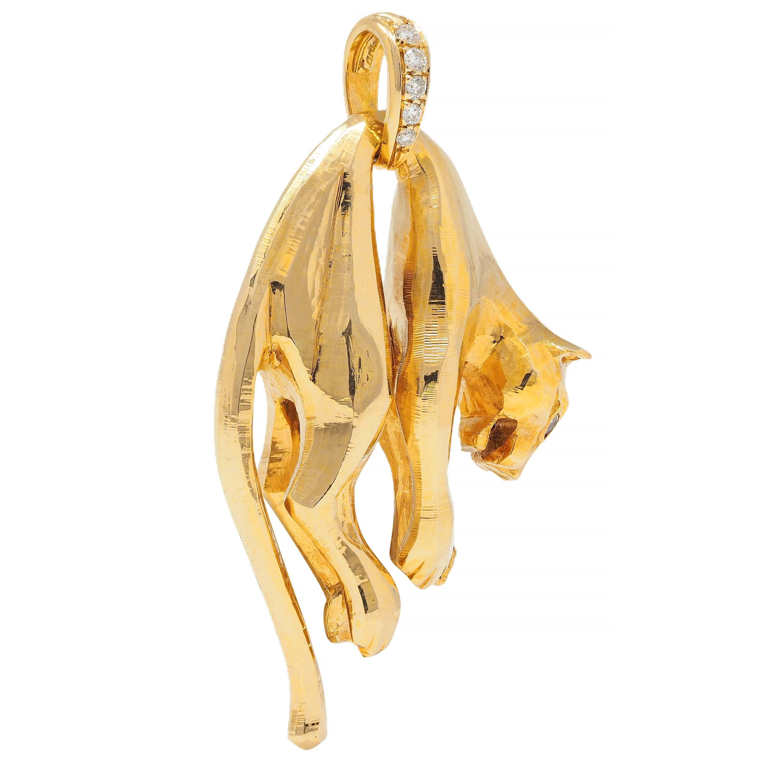Designed as a stylized panther hanging from its mid-section
With a faceted design and subtle linear texture 
Suspending from a looped bale with diamonds
Round brilliant cut and bead set in a graduated row
Weighing approximately 0.15 carat total 
Eye