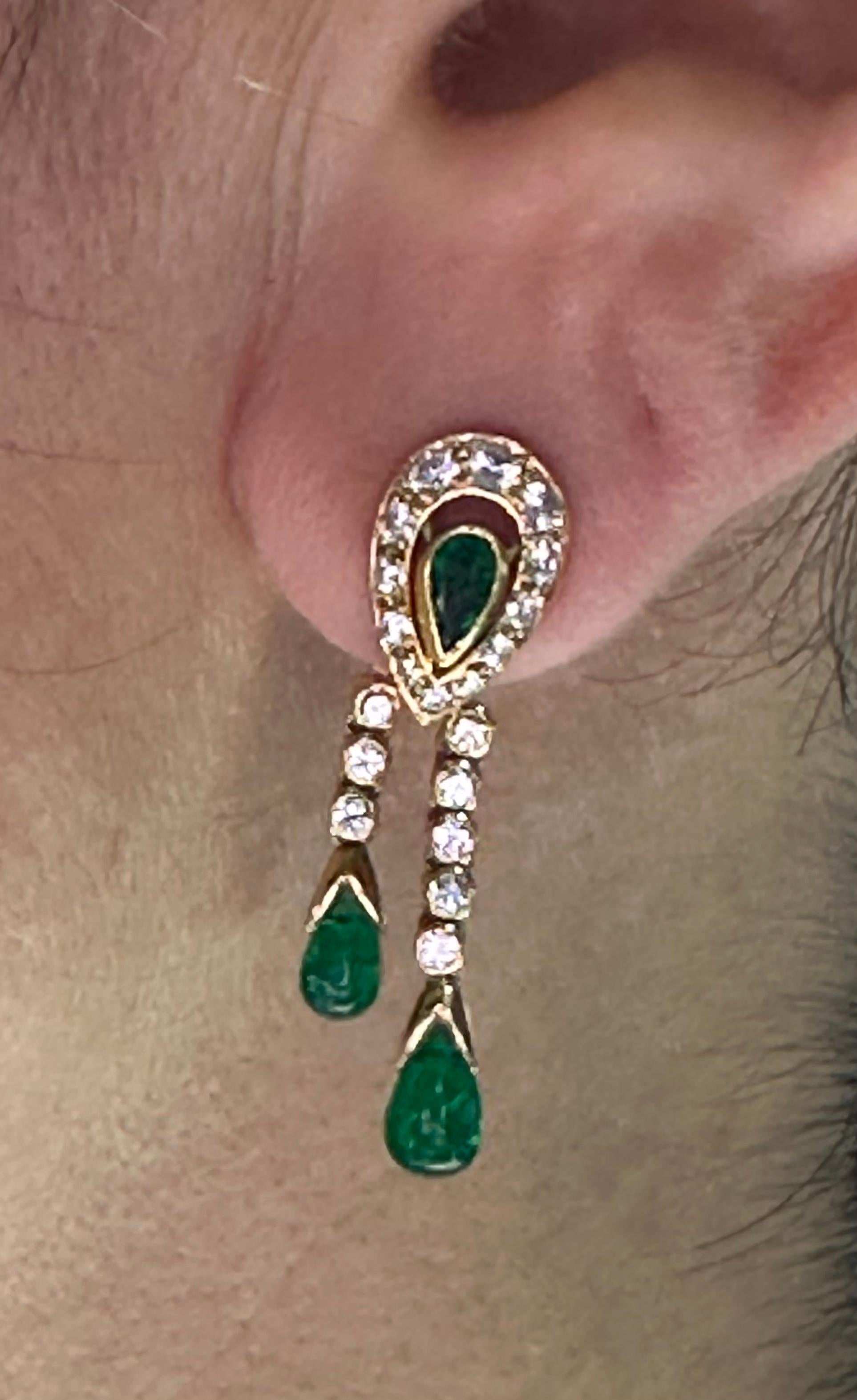 Women's or Men's Cartier 1970s diamond and emerald dangle earrings