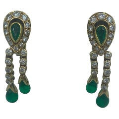 Cartier 1970s diamond and emerald dangle earrings