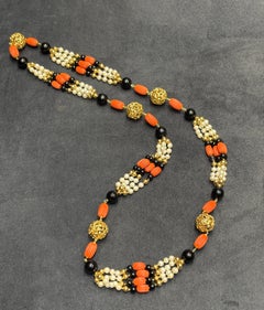 Cartier 1970s onyx, coral, pearl and 18k gold sautoire