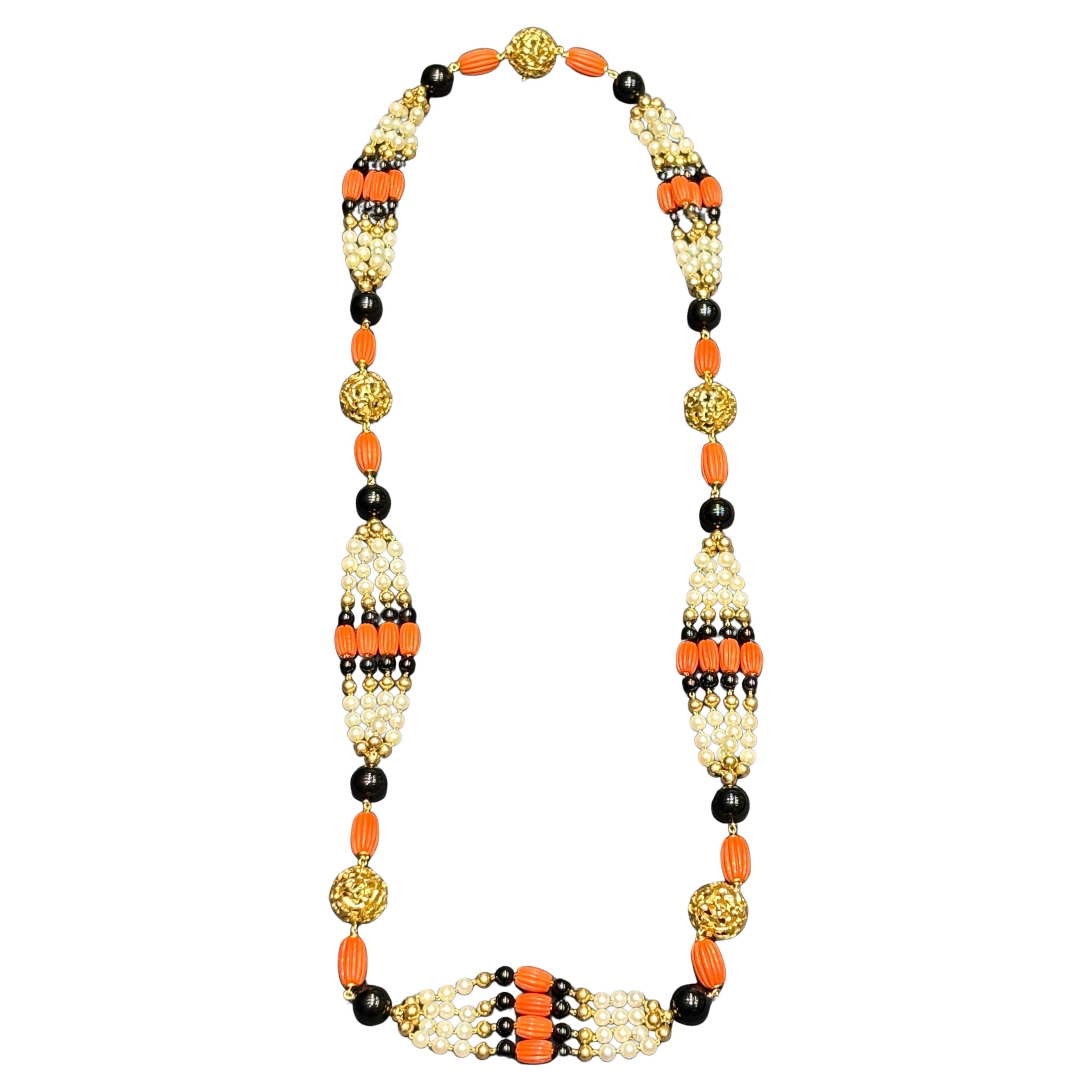 Cartier 1970s onyx, coral, pearl and 18k gold sautoire