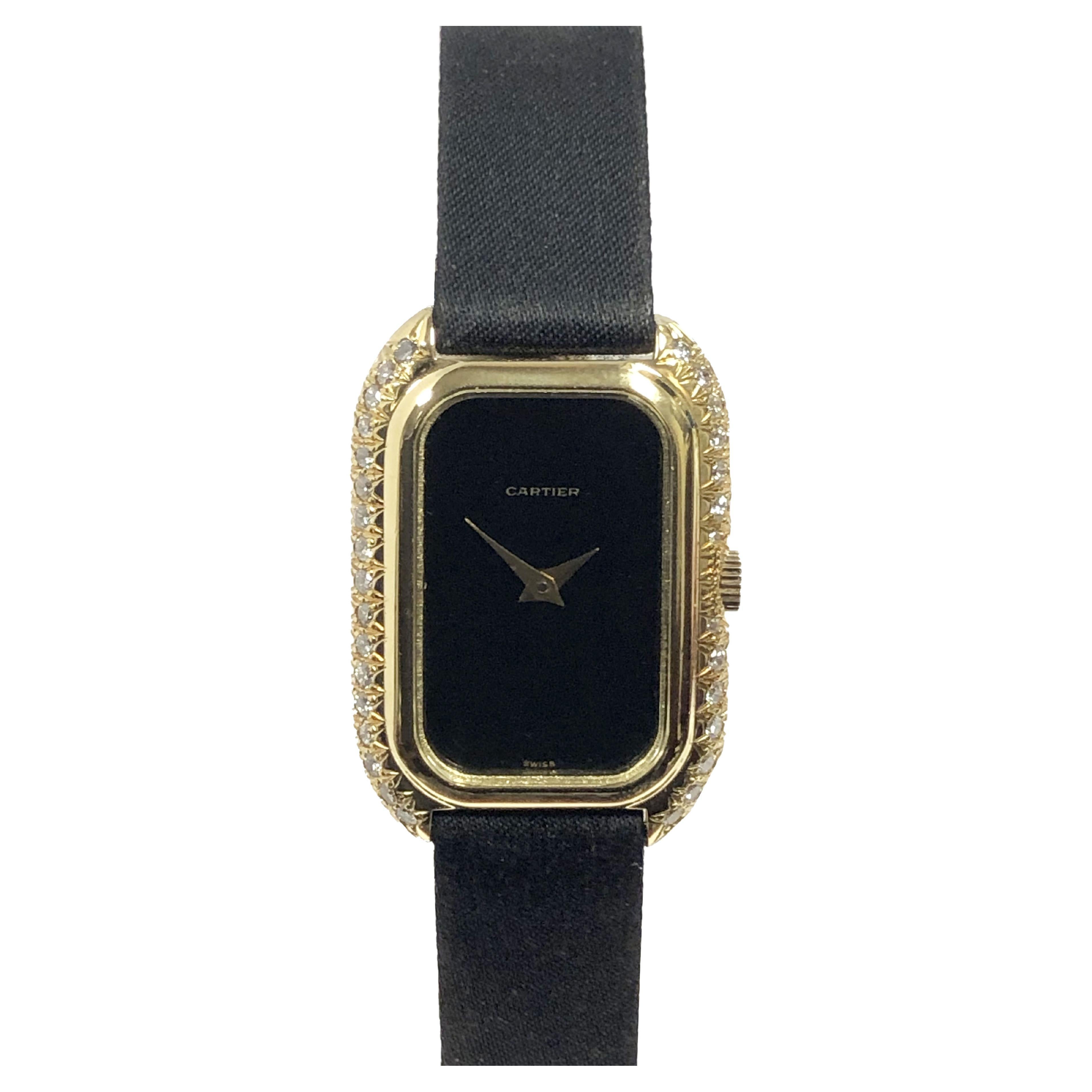 Montre-bracelet mécanique pour dames en or jaune et diamants, rare, de Cartier, datant des années 1970