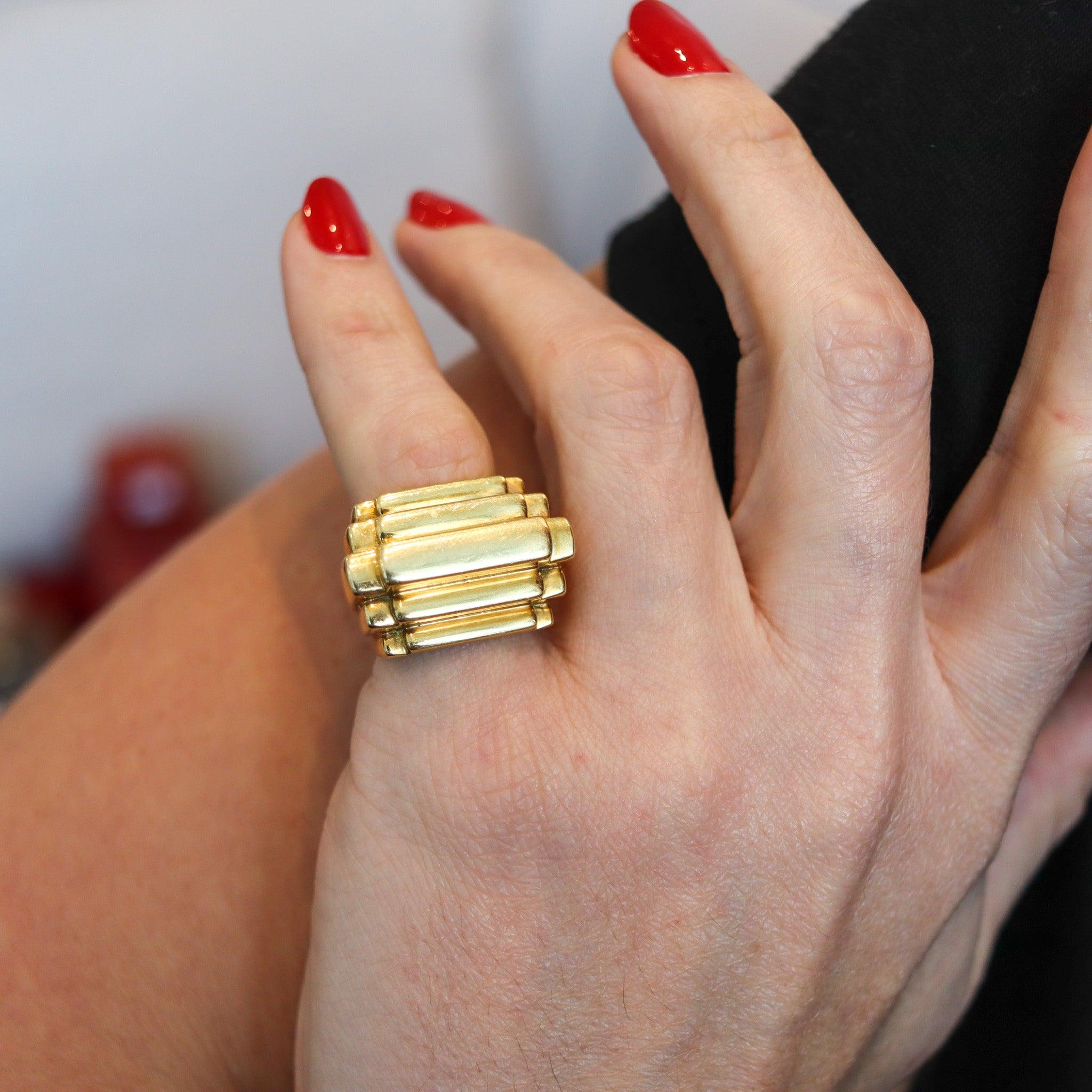 Ziggurat cocktail ring designed by Aldo Cipullo for Cartier.

This is an extremely rare bold modernist cocktail ring, created in New York city by Aldo Cipullo for the jewelry house of Cartier, back in 1971. The fabulous ring was designed with