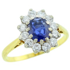 Cartier 1976 Unheated Blue Sapphire and Diamond Ring, 18 Karat Yellow Gold Cartier 1976 Unheated Blue Sapphire and Diamond Ring, 18 Karat Yellow Gold