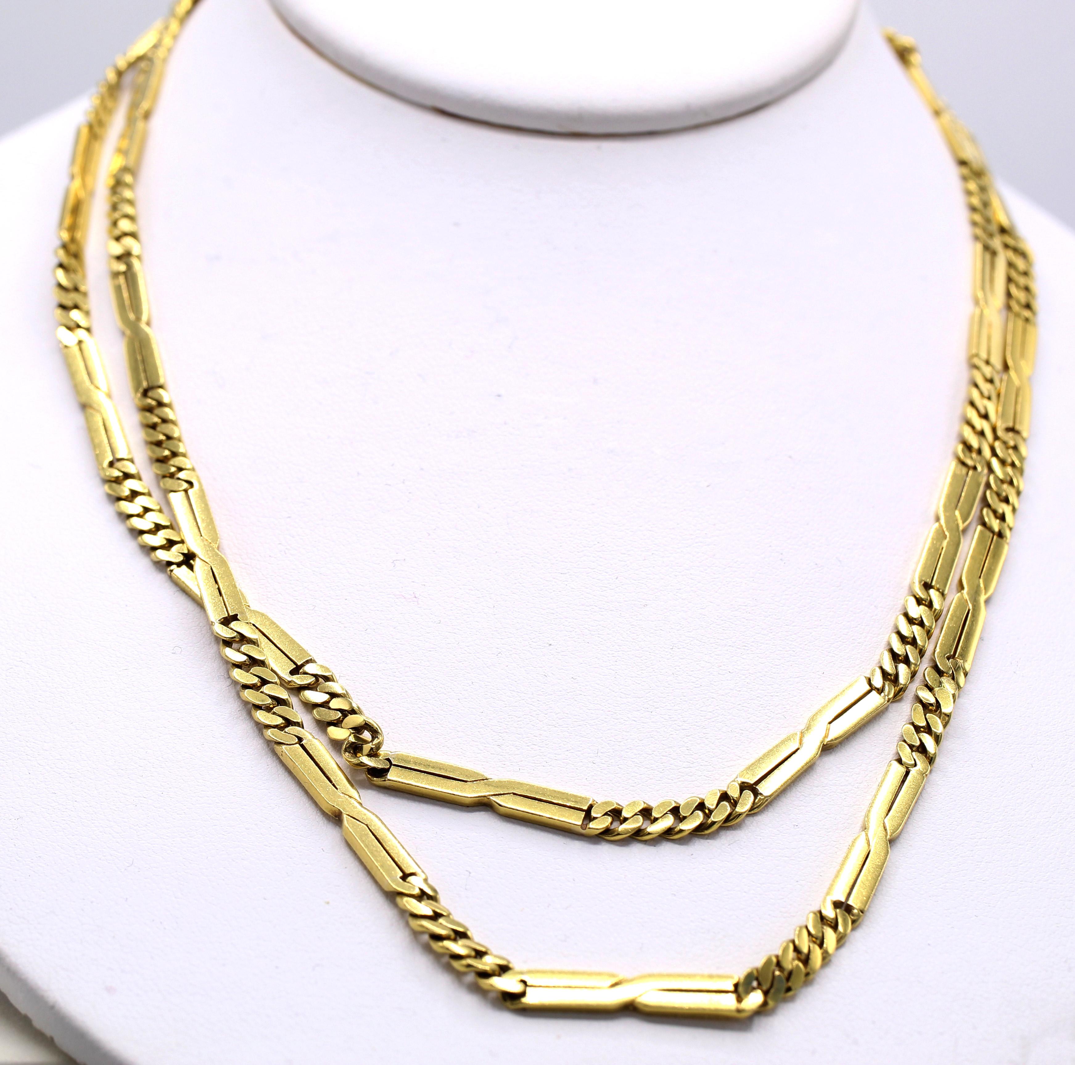 Chic 1980s Cartier 18 karat yellow gold long chain necklace, can be casually worn at full length of 35 inches or doubled up as a choker. The flexible alternating curb link and flat bar link motifs give this necklace its cool and individualistic