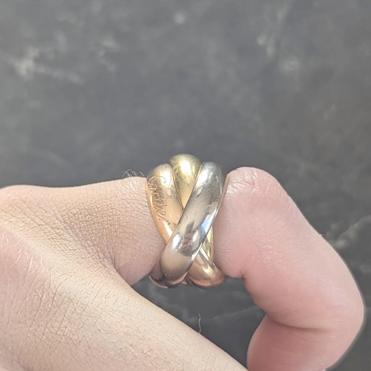 Cartier 1980's 18 Karat Tri-Gold Vintage Trinity Rolling Band Ring For Sale 7