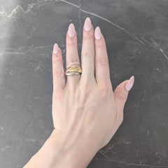 Cartier 1980's 18 Karat Tri-Gold Vintage Trinity Rolling Band Ring