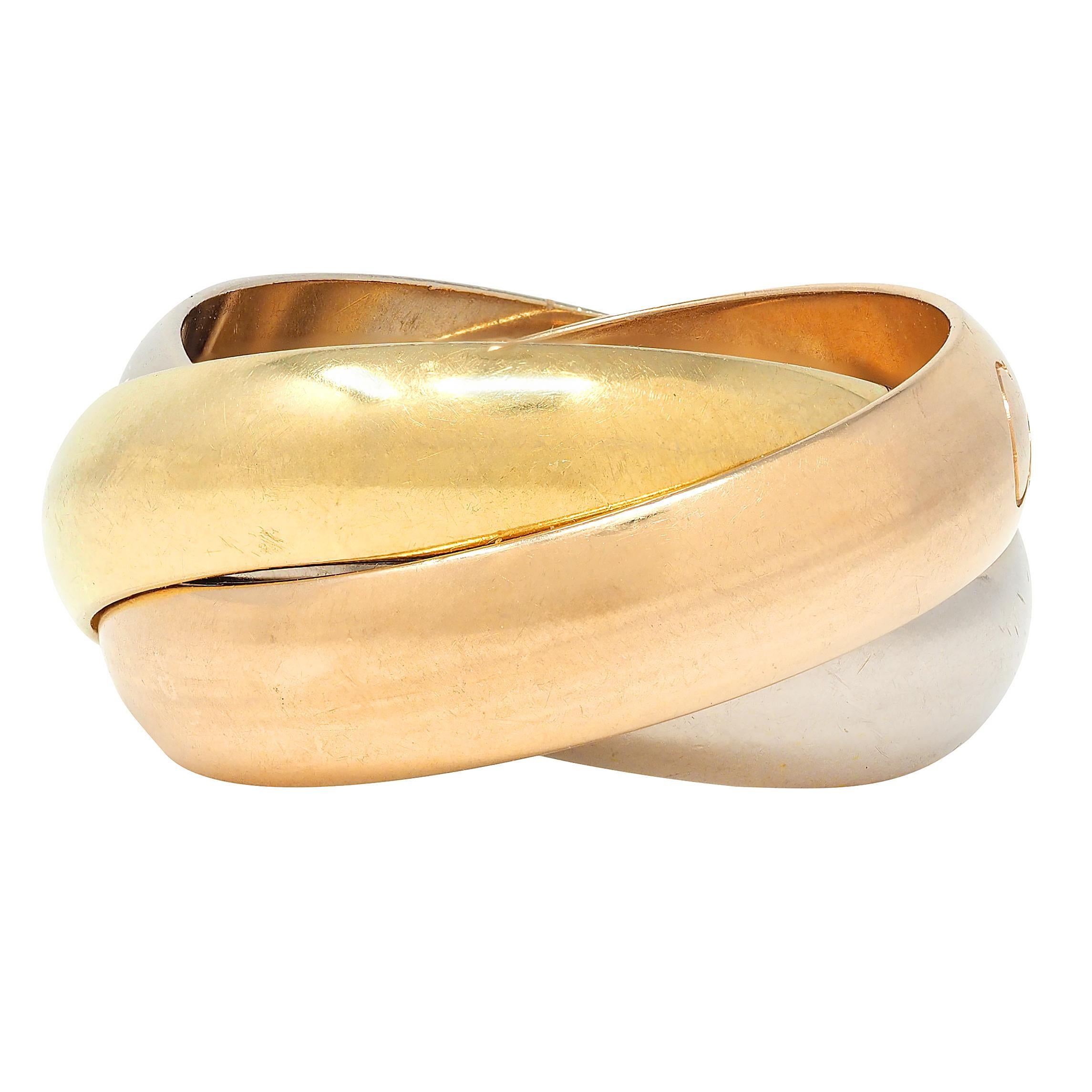 Women's or Men's Cartier 1980's 18 Karat Tri-Gold Vintage Trinity Rolling Band Ring For Sale