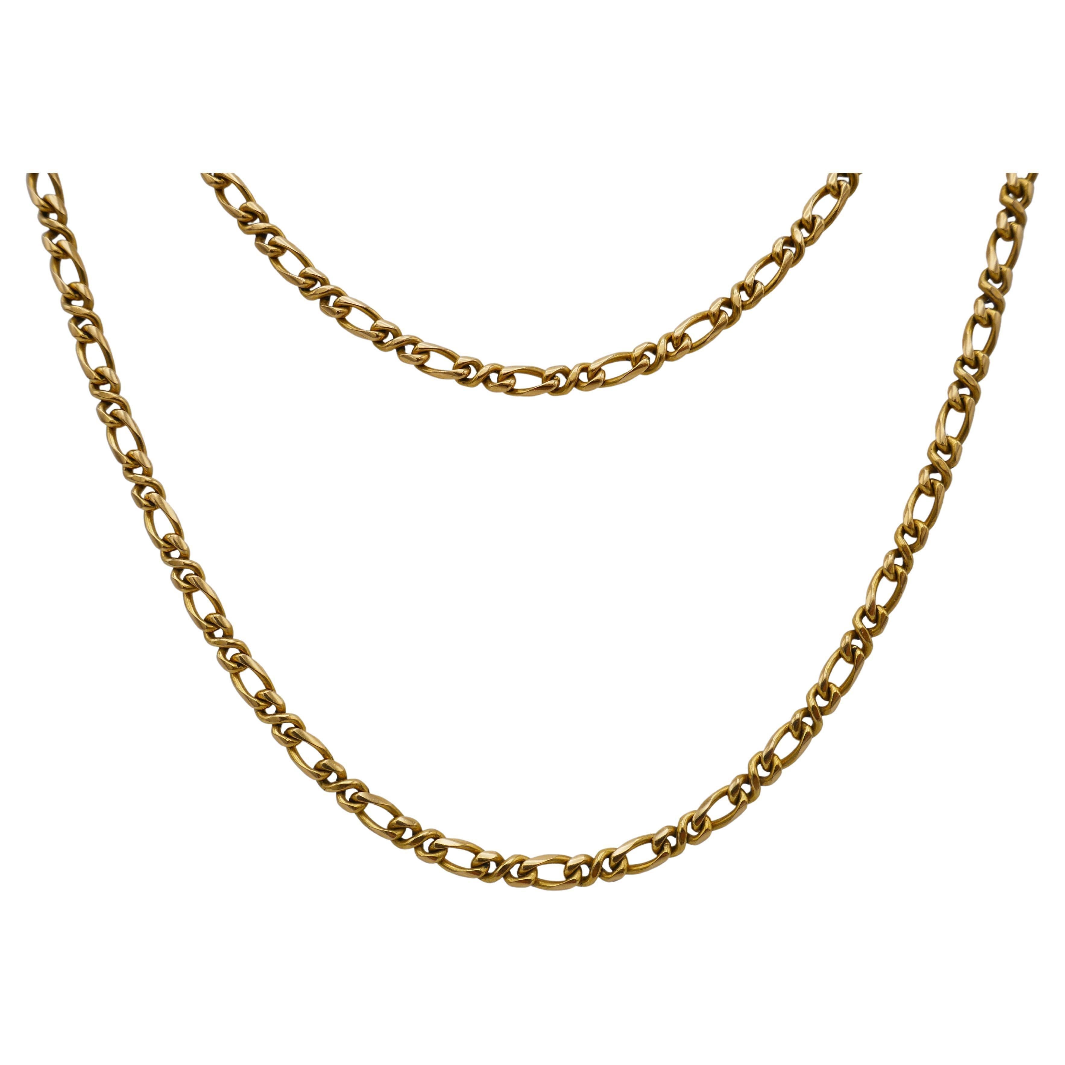 A vintage (1985) Cartier Figaro link gold chain necklace. Is perfect for layering or wearing solo. Stamped with Cartier maker's mark and a hallmark for 18k gold. 
Measurements: 31.5