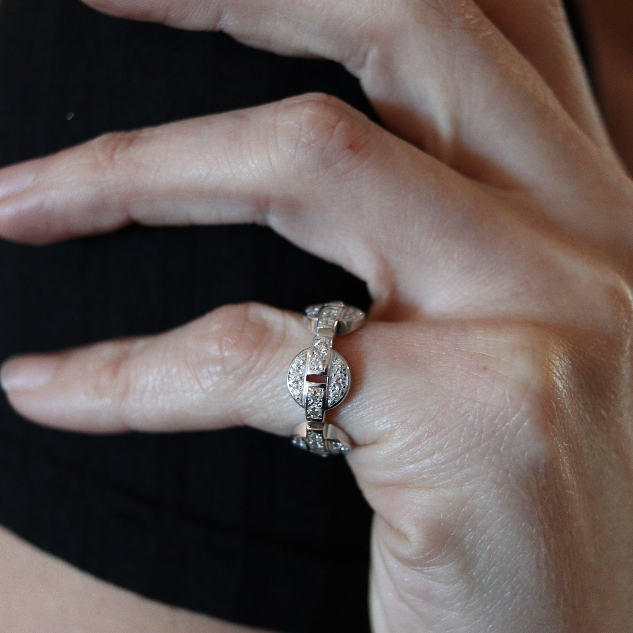 Himalia eternity ring designed by Cartier.

This is a gorgeous Himalia eternity ring created in Paris France by the jewelry house of Cartier, back in the 2000. The iconic ring was carefully crafted as a continuous design in solid white gold of 18